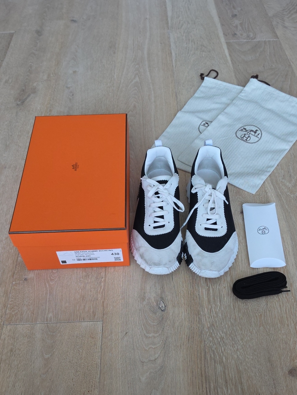 Hermès Black and White Bouncing Sneakers